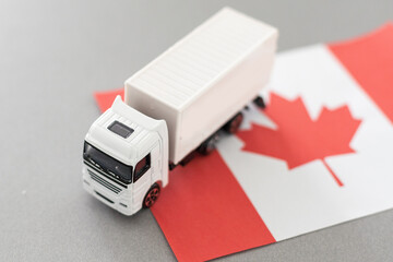Symbol of National Delivery Truck with Flag of Canada. National Trucking Icon and Canadian flag