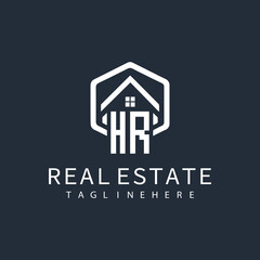 initial monogram logo for real estate with building shape creative design	
