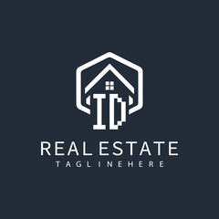 initial monogram logo for real estate with building shape creative design	
