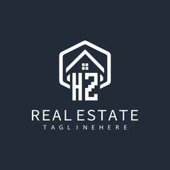 initial monogram logo for real estate with building shape creative design	
