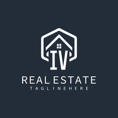 initial monogram logo for real estate with building shape creative design	
