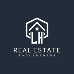 initial monogram logo for real estate with building shape creative design	
