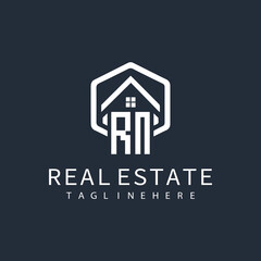 initial monogram logo for real estate with building shape creative design	
