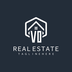 initial monogram logo for real estate with building shape creative design	
