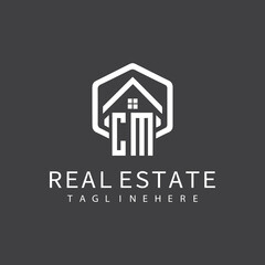 initial monogram logo for real estate with building shape creative design	
