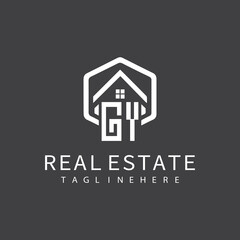initial monogram logo for real estate with building shape creative design	
