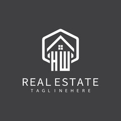 initial monogram logo for real estate with building shape creative design	
