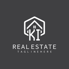 initial monogram logo for real estate with building shape creative design	
