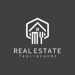 initial monogram logo for real estate with building shape creative design	
