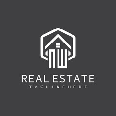 initial monogram logo for real estate with building shape creative design	

