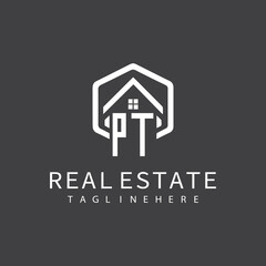 initial monogram logo for real estate with building shape creative design	
