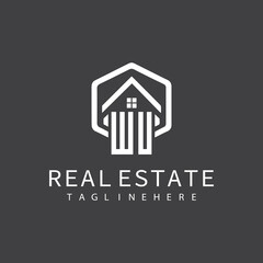 initial monogram logo for real estate with building shape creative design	
