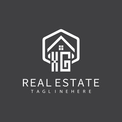 initial monogram logo for real estate with building shape creative design	
