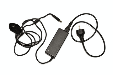 The laptop power supply assembly lies on a white background.