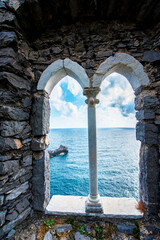 A magical landscape with the ancient ruins of the castle in Porto Venere, Liguria, Italy. Exotic amazing places. Popular tourist atraction.