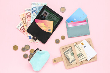 Composition with credit holders, cards, driver's license, purse and money on pink background, closeup - obrazy, fototapety, plakaty