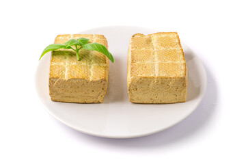 Tofu Cheese Isolated, Smoked Vegan Cheese Slice, Sliced Soya Bean Curd, Soy Protein or TSP