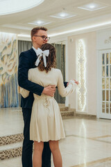 Sweet and modest wedding ceremony. The concept of creating a family and love. Wedding elements and decorations