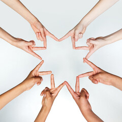 Children showing peace hand sign and standing in circle against grey background. Cropped photo of...
