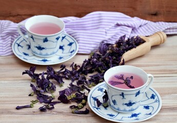 Two cups of herbal tea from dried flowers of Wild mallow, lat.  Malva sylvestris. Traditional...