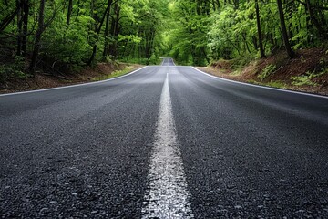 Fototapeta premium Scenic highway leads to a sunset-lit mountain range on an open road journey. Beautiful simple AI generated image in 4K, unique.