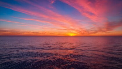 A colorful sunset over a calm ocean