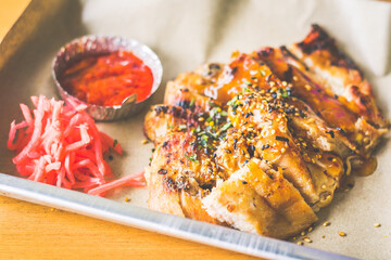 A La Carte Grilled Pork Cheek served with pickled ginger and chilli sauce