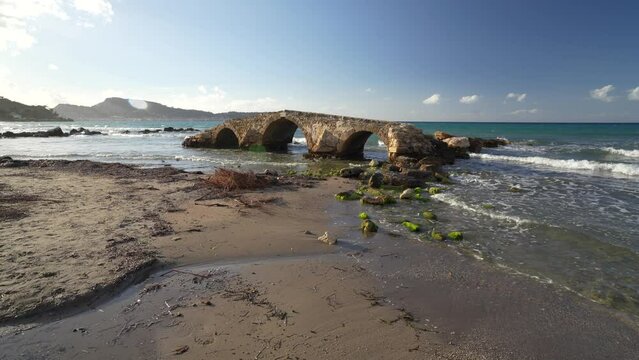 old historical stone bridge shore and beach of ARgassi , Zakynthos