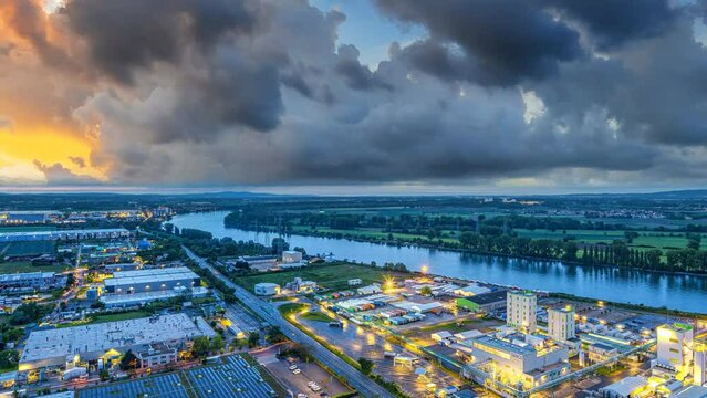 Industrial area, of Worms at Rhine River, evening aerial 60 fps 4k