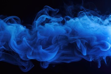 Fototapeta premium Blue smoke on black background. Color smoke. Water splash. Cosmic stardust.