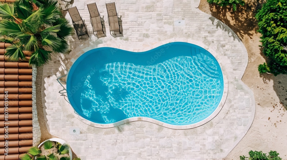 Aufkleber a swimming pool sits in the center of a group of palm trees, creating a tropical oasis from above