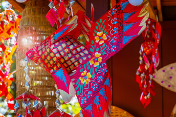 A school of Thai traditional colorful  mobile woven carp