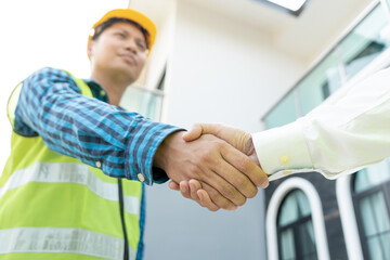 Construction team hands shaking greeting start up plan new project contract in office center at...