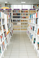 Book shelves and bookcase of library or bookstore. Bookshelf with antique and modern literature...