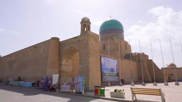 View of Kalan Minaret Emir and Alim Khan madrasah of Po-i-Kalan (Poi Kalan) - islamic religious complex Bukhara, Uzbekistan