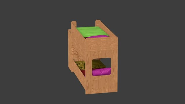 A wooden bunk bed with a green and red bed on the top bunk. The bed is decorated with pillows and a blanket