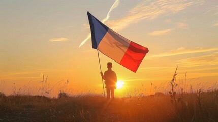 Patriotic Individual Holding French Flag at Sunset