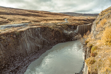 Stuðlagil ravine in Jökuldalur, Múlaþing, Iceland. Columnar basalt rock formations. River...