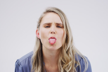 Studio, portrait and woman with tongue out, comic and goofy expression with mockup space. Face,...