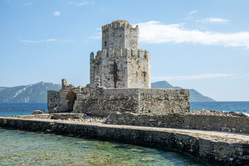 methoni castle in greece with blue clear sea
