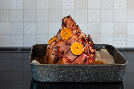 christmas ham in roasting dish