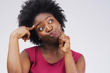 Black woman, crazy and thinking in studio for comic, comedy and silly emoji by white background....