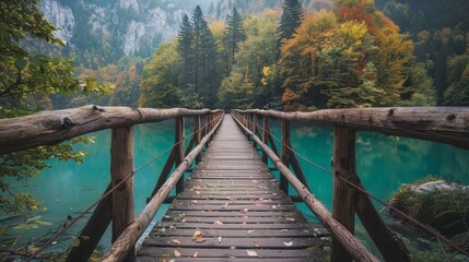 Wooden bridge over lake in the mountains 