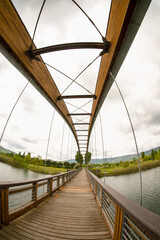 Fototapeta premium Italy Florence, Barberino del Mugello, Bilancino Lake, Lakeside Trekking and Panoramic Views the footbridge