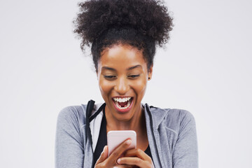 Woman, athlete and phone surprise in studio, victory notification and lottery success. Black model,...