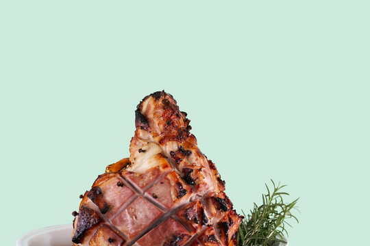 christmas ham against light aqua background