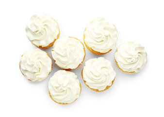 Tasty vanilla cupcakes with cream isolated on white, top view