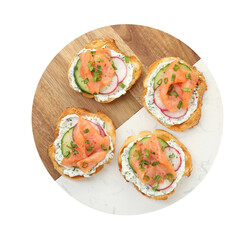 Tasty canapes with salmon, cucumber, radish and cream cheese isolated on white, top view