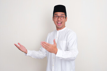 Moslem Asian man showing wow face expression