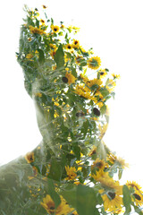 A double exposure full front portrait disappearing into sunflowers photo